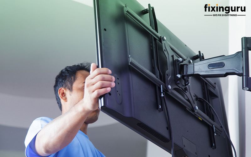 Man Installing Tv Brackets-Tv Bracket Installation Singapore